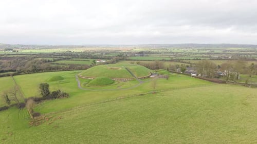 Flying Towards The Knowth, Prehistoric Tomb In County Meath, Ireland. - aerial shot