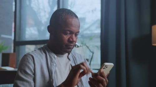 Gentle Evening Scene Family Enjoying Cozy Indoor Evening Relaxed Man Browsing Messages on