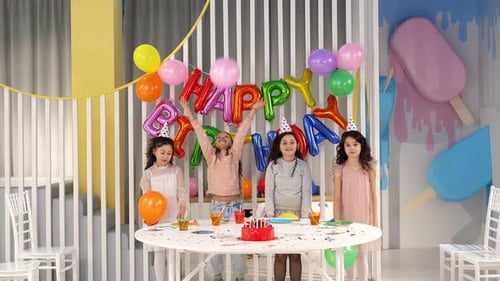 Cheerful Girls Celebrating Birthday Party With Balloons
