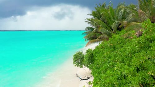 Beautiful Wild White Sand Beach with Turquoise Sea on Thoddoo Island in Maldives