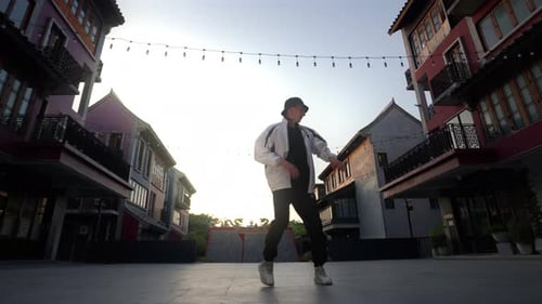 Young Man Breakdancing In Bangkok Street