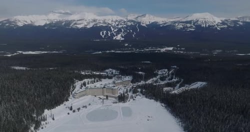 aerial view of Fairmont Chateau Lake Louise with frozen lake during winter