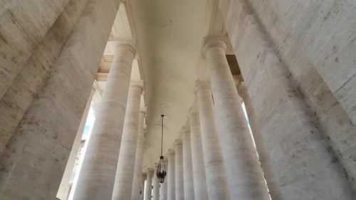 Great Famous colonnade of St. Peter's Basilica in Vatican city in Italy