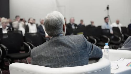 Audience Attending a Corporate Conference