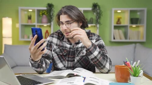 Student Video Calling While Studying at Home