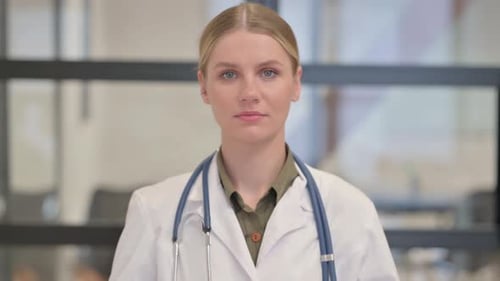 Female Doctor Wearing Stethoscope and Lab Coat