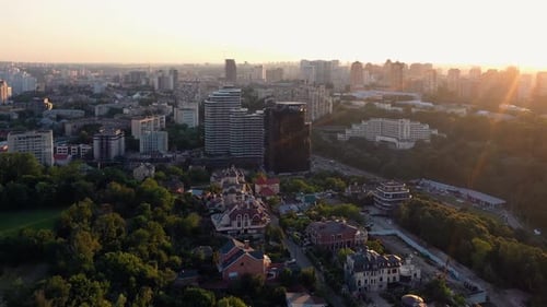 Aerial View of Modern Cityscape City Buildings and Street with Driving Cars