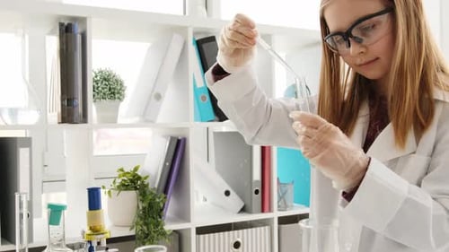 School Girl in Chemistry Class
