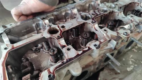 Repair And Replacement Of Broken Car Engine Valve Cover