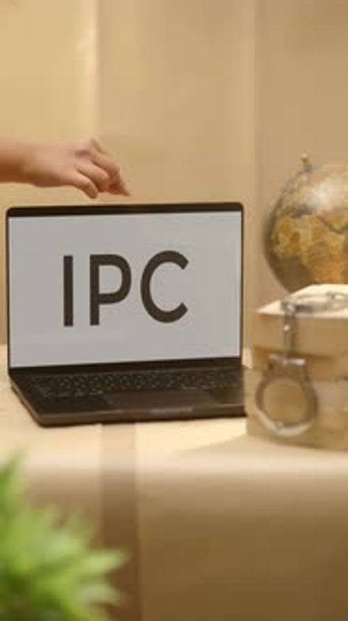 Laptop Being Opened on Wooden Table Indoors