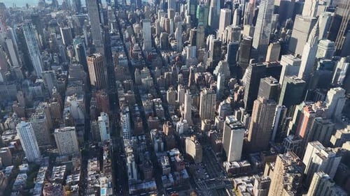 Aerial video above skyscrapers and skyline in Manhattan, New York