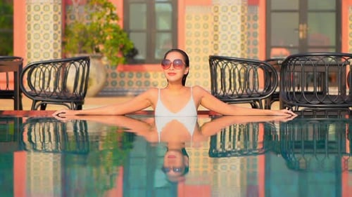 Female Model Reflection in Swimming Pool Water, Hotel Background SLOMO
