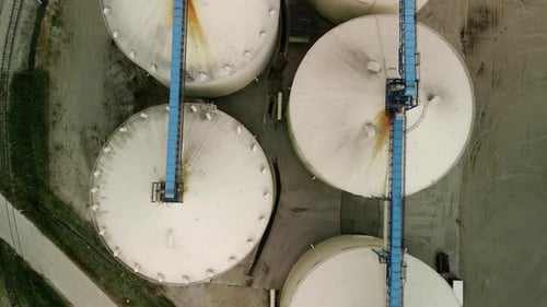 Aerial Top View of Agro Silos Granary Elevator Grain Storage Tanks Plant Top View