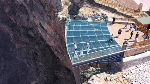 Aerial View Of People Enjoying The View On The Glass Terrace On The Hill