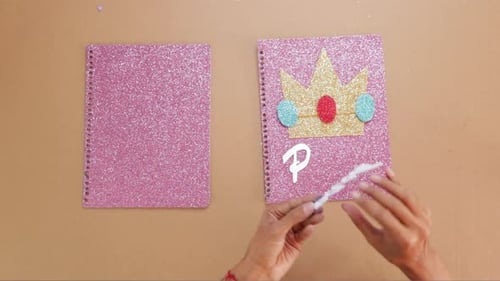 Decorating a Pink Glittery Notebook with Glue