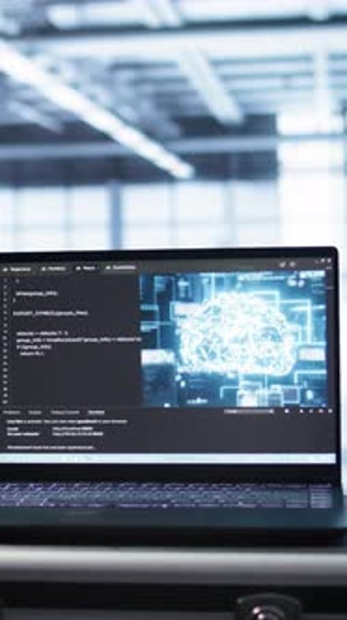 Vertical Video Laptop in Data Center Facility with Artificial Intelligence Simulation