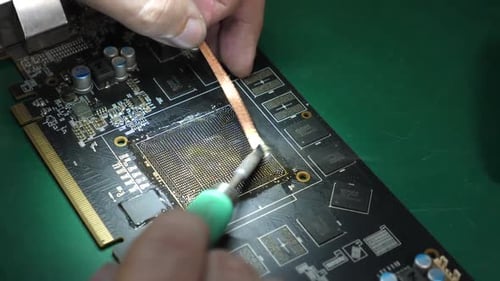 Soldering Wire on a Circuit Board