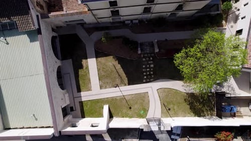 Birds-eye view of a quiet residential back garden in Montpellier, France