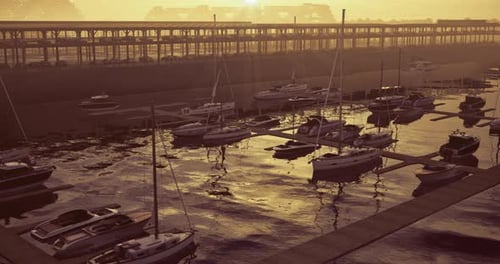 Sunset Over the Marina with Boats Docked Near the Waterfront Promenade
