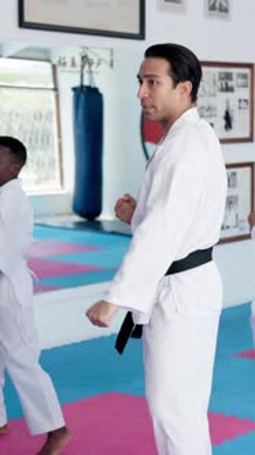 Man Demonstrates Martial Arts Moves in Studio