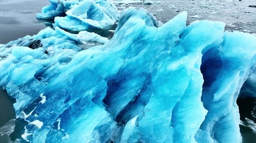 Cinematic Drone View of the Sharp Ice Ridges of Glacier Blue Ice Natural Landscape of the Icelandic
