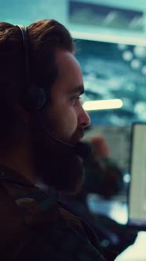 Young Adults Work in Futuristic Control Room