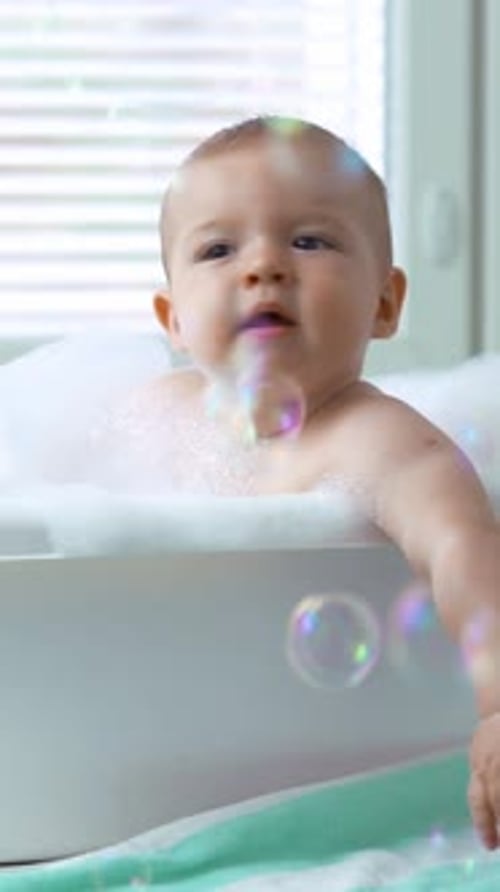 Adorable Baby Taking a Bubble Bath