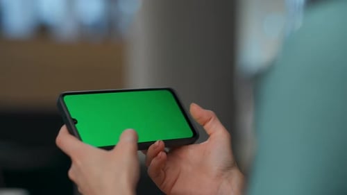 Director Arms Playing Mockup Smartphone Game Indoors