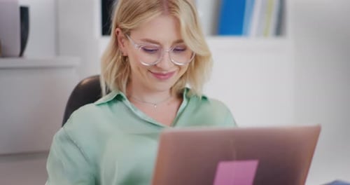 Happy Woman Working on Computer CloseUp Face