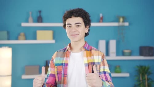 Smiling Teen Gives Thumbs Up of Approval