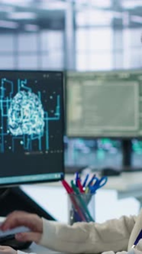 Portrait of Smiling Technician Programming in AI Data Center