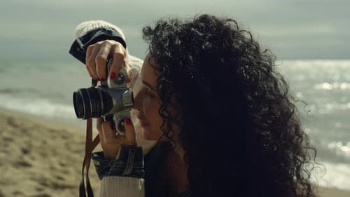 Hispanic Woman Photography Beach at Sunset