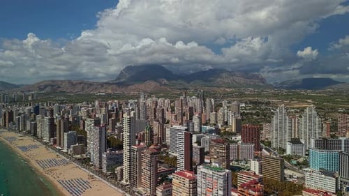 Aerial Panoramic View of Benidorm City Skyline with Dense Highrise Buildings Mediterranean Coastline