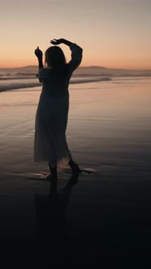 Silhouette Woman Beach Sunset