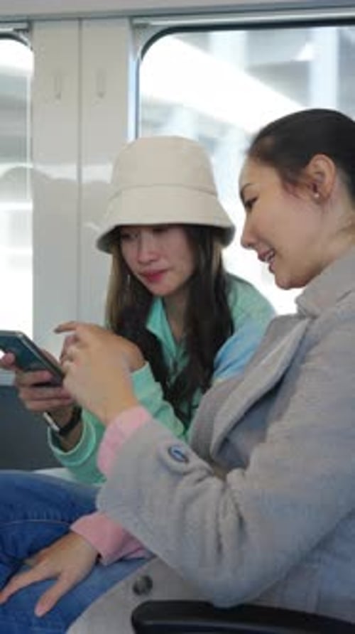 Young Adults Using Mobile Phone on Public Transit