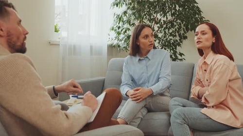 People Conversing During Counseling Session Indoors