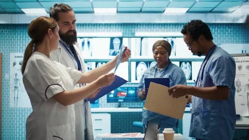 Medical Team Collaborating in Hospital Examination Room