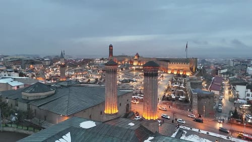 Illuminated European City at Dusk Aerial View