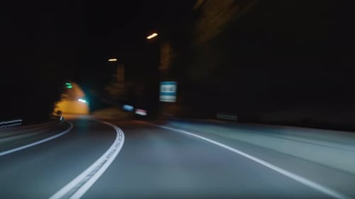 Timelapse of a Speedy Night Drive Trip Through the Madeira Tunnels View From the Car Windshield to