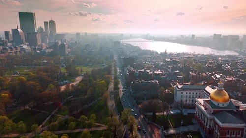 Multiple cars go by the roads of Boston, Massachusetts, USA.