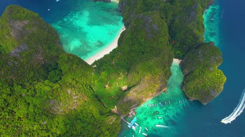 Aerial view over paradise island in tropical sea.