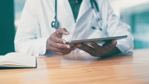 Hands, tablet and doctor in hospital with research, digital medical record