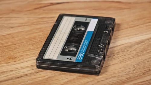 Retro Audio Cassette on Wooden Table