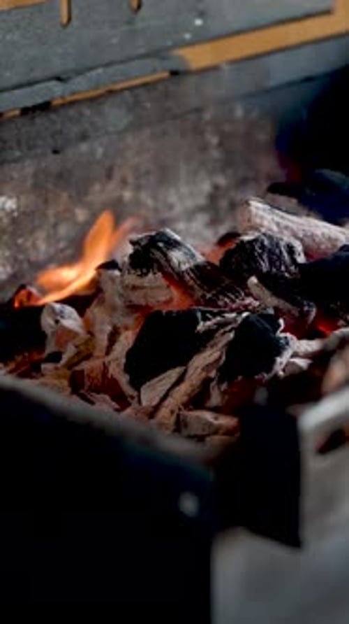 Charcoal Burning in Bottom of a Barbecue Pit