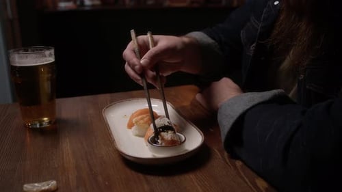 Man Eating Sushi
