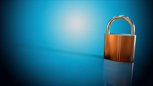 Golden padlock on blue background
