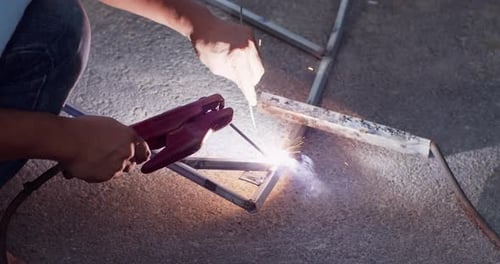 Man Cuts Rusty Metal Beam Using Round Turbine Blacksmith Performing Welding Repair Work Using
