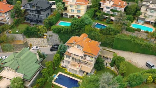 top view of houses with pools