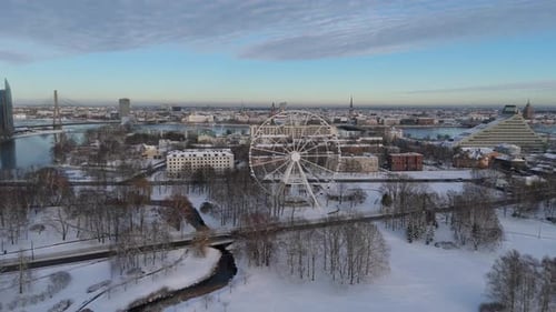 Latvia, Riga Winter Aerial View of City Skyline, Ferris Wheel, Riga Castle, Old Town Daugava River
