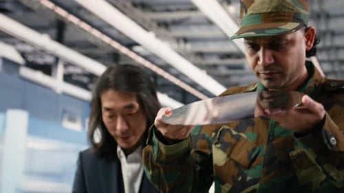 Close Up of Microchip Factory Expert and Military Intelligence Officer